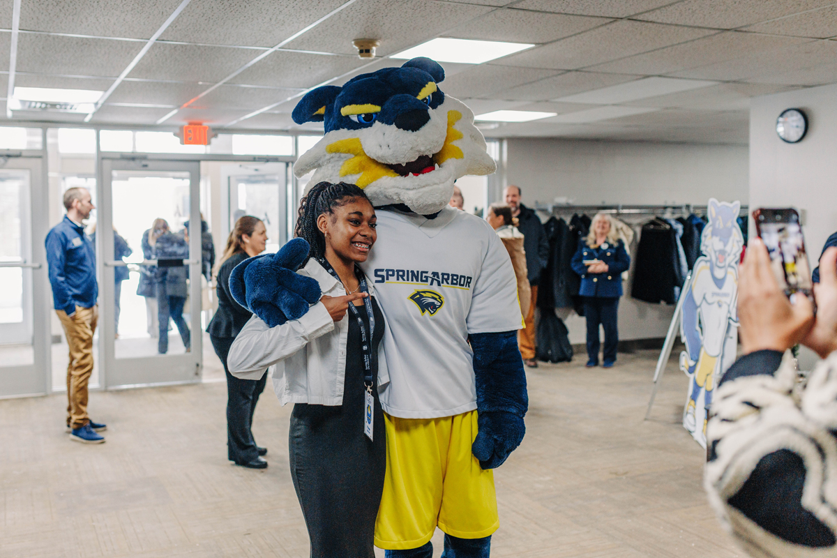 Student posing with blue in the Arbor Church.