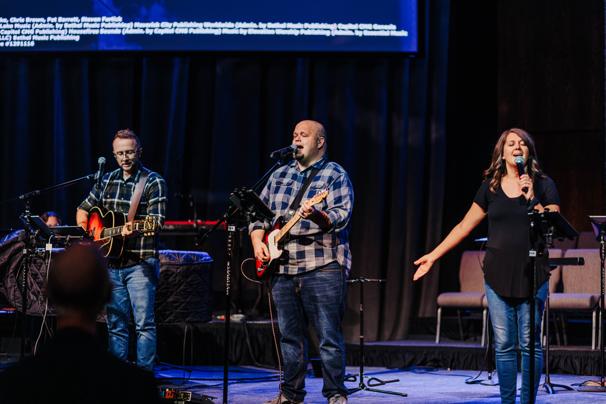 Alumni leading worship at Chapel.
