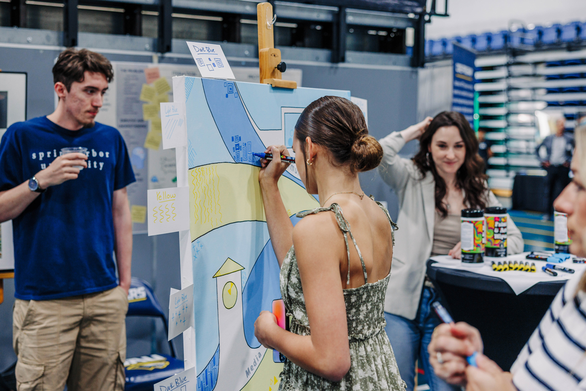 Woman drawing on Canvas at Evening at the Arbor.