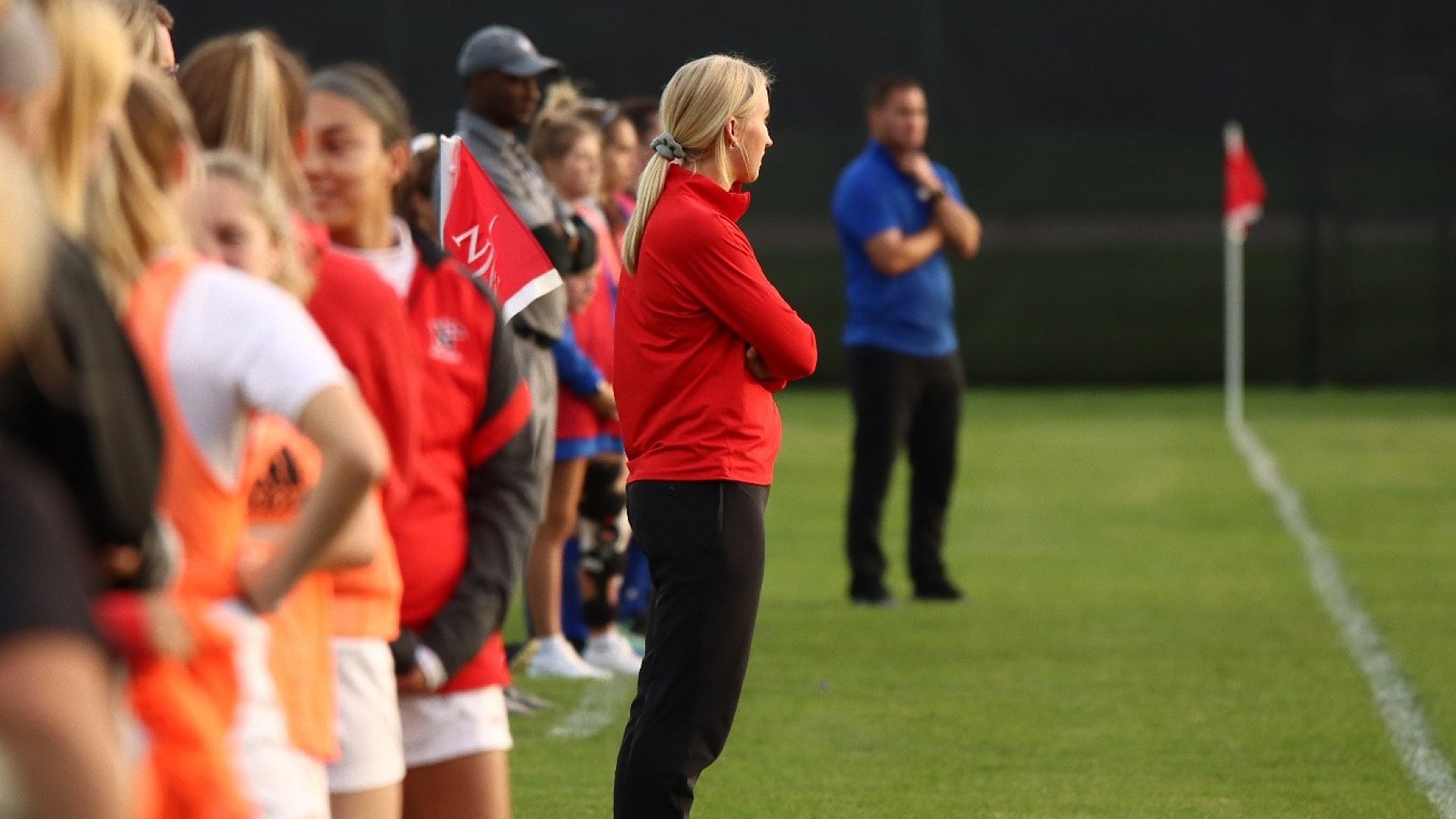 Shannon (Balcer) Andringa coaching on the sidelines