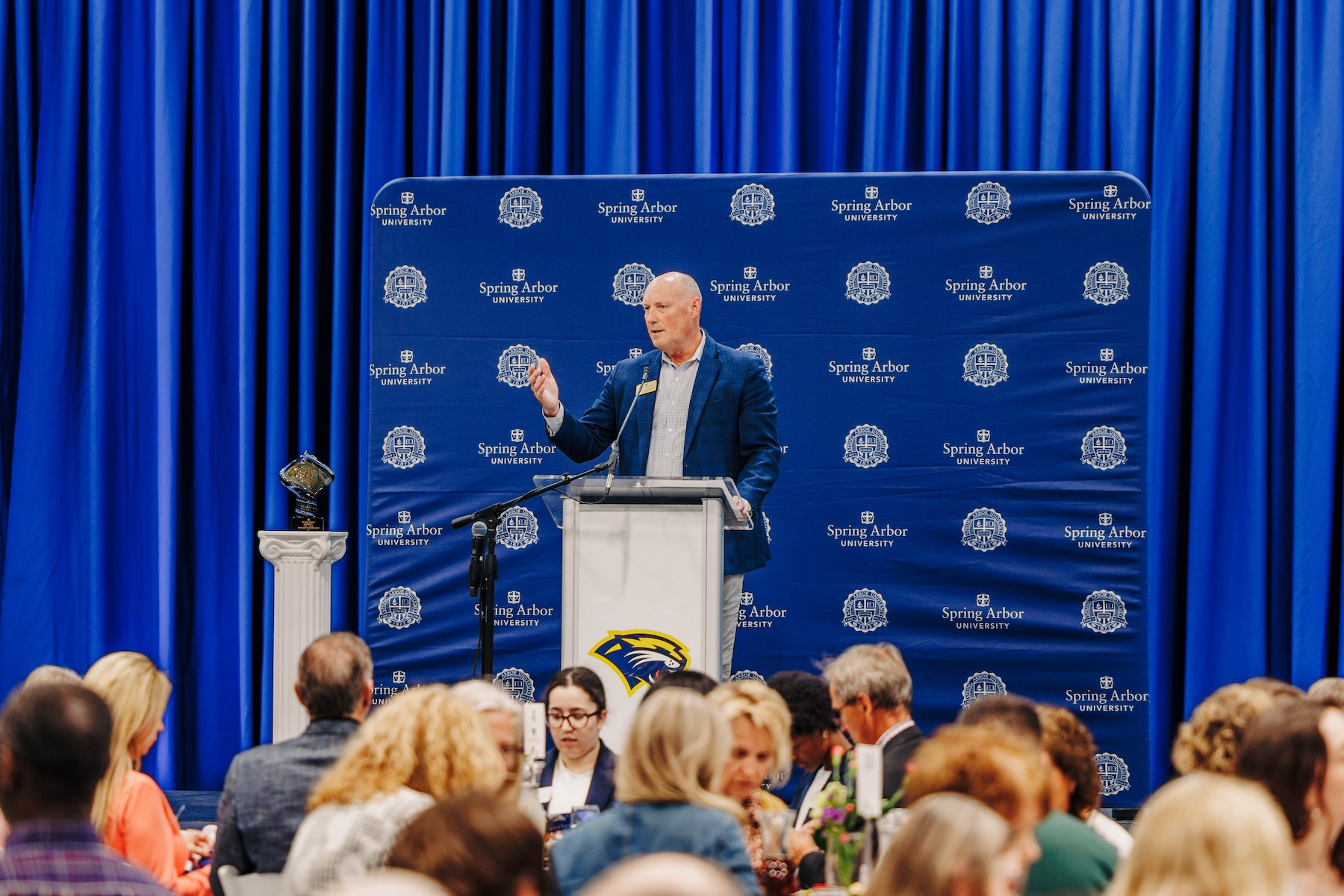 Executive Vice President Doug Wilcoxson speaking at An Evening at the Arbor 2025