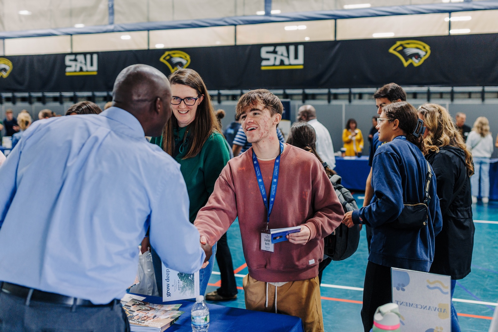 A student making a connection at a student life fair