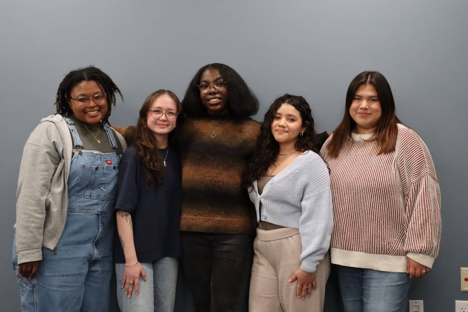 A group of college students employed by the office of intercultural relations