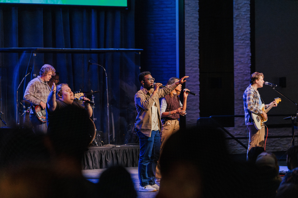Student leaders worshiping in chapel.